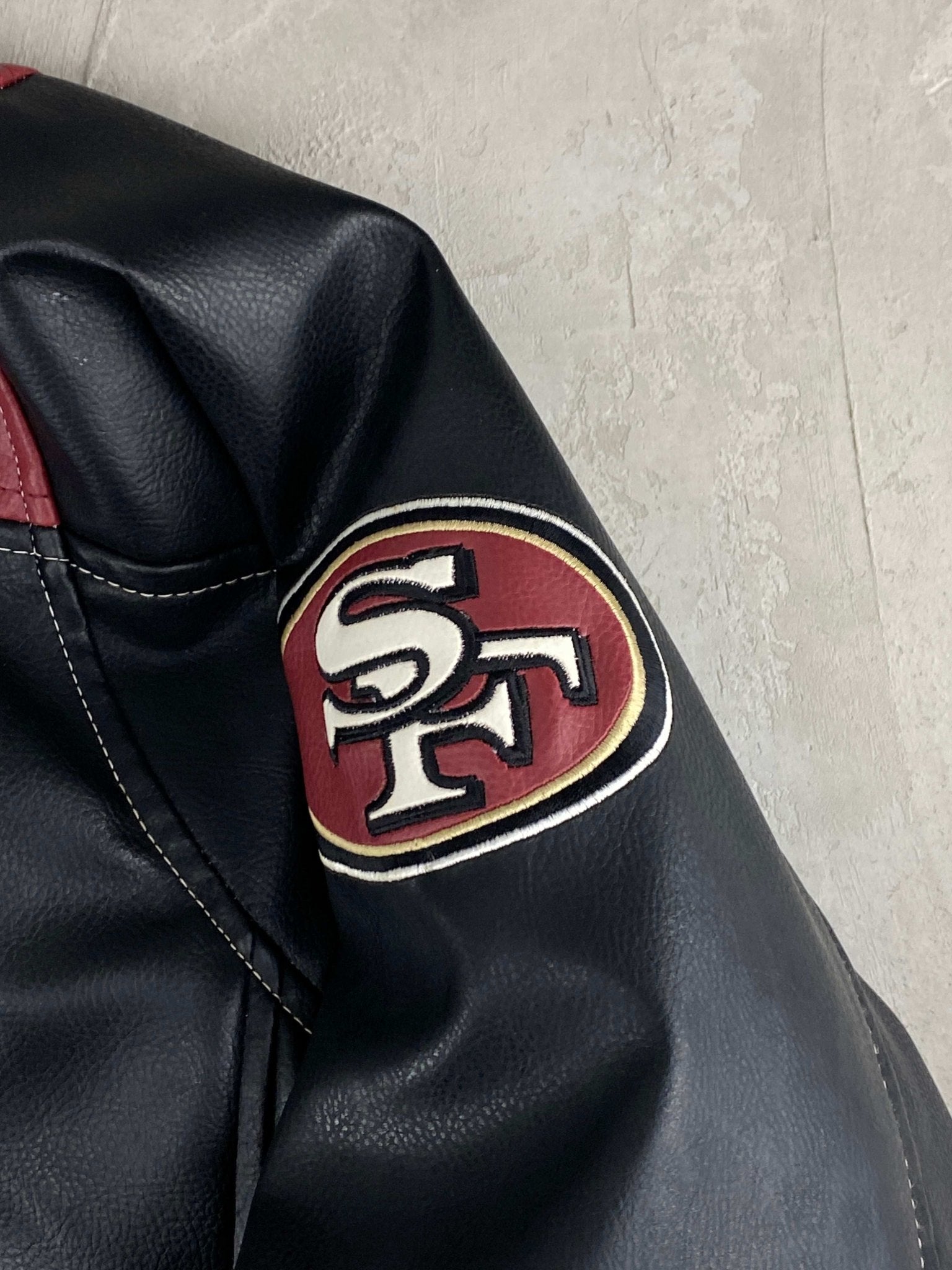 NFL 49ers FAUX LEATHER VARSITY JACKET BLACK/BURGUNDY (XL) - XL - grabbers.studio