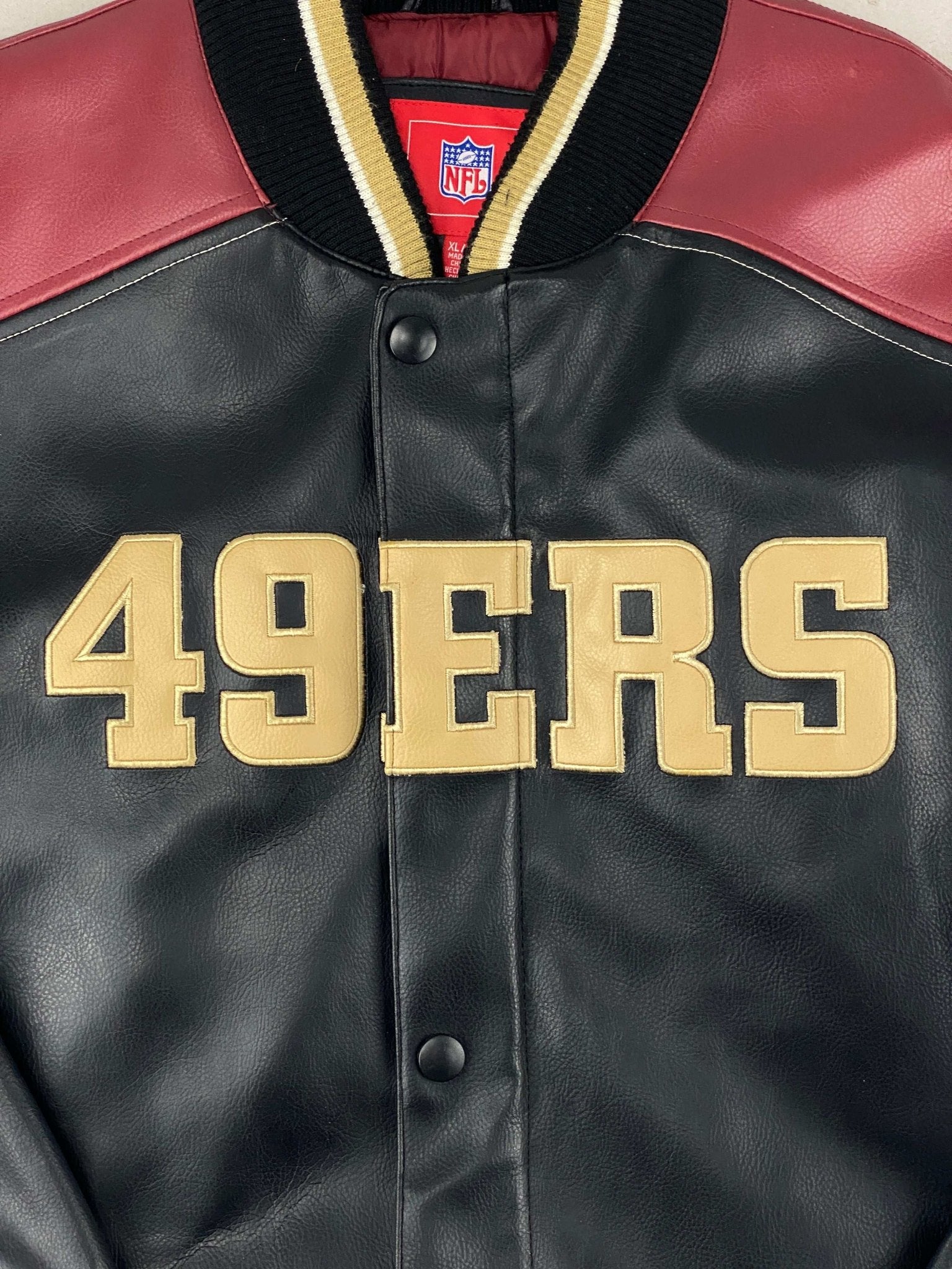 NFL 49ers FAUX LEATHER VARSITY JACKET BLACK/BURGUNDY (XL) - XL - grabbers.studio